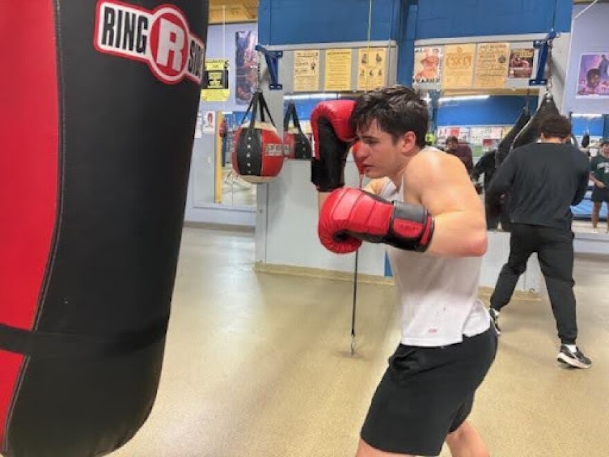 Alex Ziouras trains during a heavy bag session.