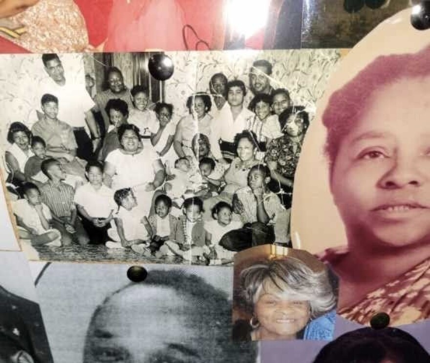 Stacie Nash is saddened that she did not get to grab a few more family photos from her third floor wall before the storm blew in. One of her favorite photos is the center photo of her family taken in 1959 with Nash's mother, who was pregnant with her in the photo. The family photo was taken inside of Nash's home off Cates Avenue.