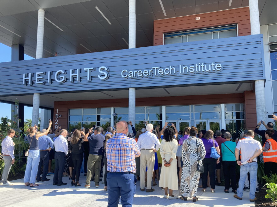 A couple of hundred people attended a ribbon cutting and official opening for a new vo-tech institute in Lee County.