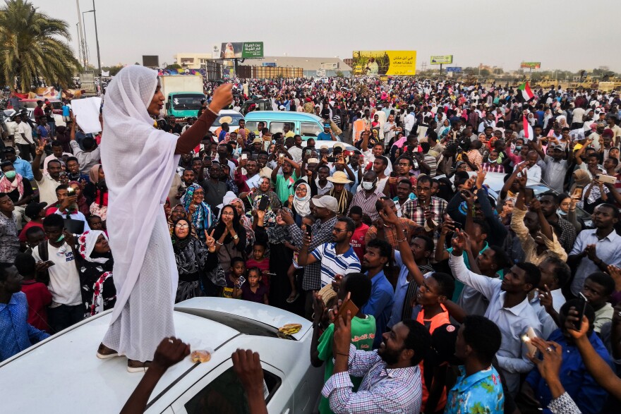 Standing on a white car and wearing a traditional white thobe, Sudanese student Alaa Salah led protest chants against longtime dictator President Omar al-Bashir in Khartoum in April 2019. A social media post showing a photo of Salah went viral, and she was dubbed Sudan's "Lady Liberty." Sudan's military ousted Bashir that same month.