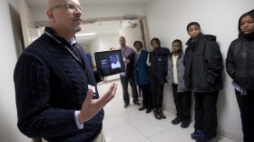 Scott Charles, Cradle to Grave's trauma outreach coordinator, tells a group of students the story of 16-year-old Lamont Adams, who was shot more than a dozen times in North Philadelphia in 2004. Lamont died shortly after arriving at Temple University Hospital.