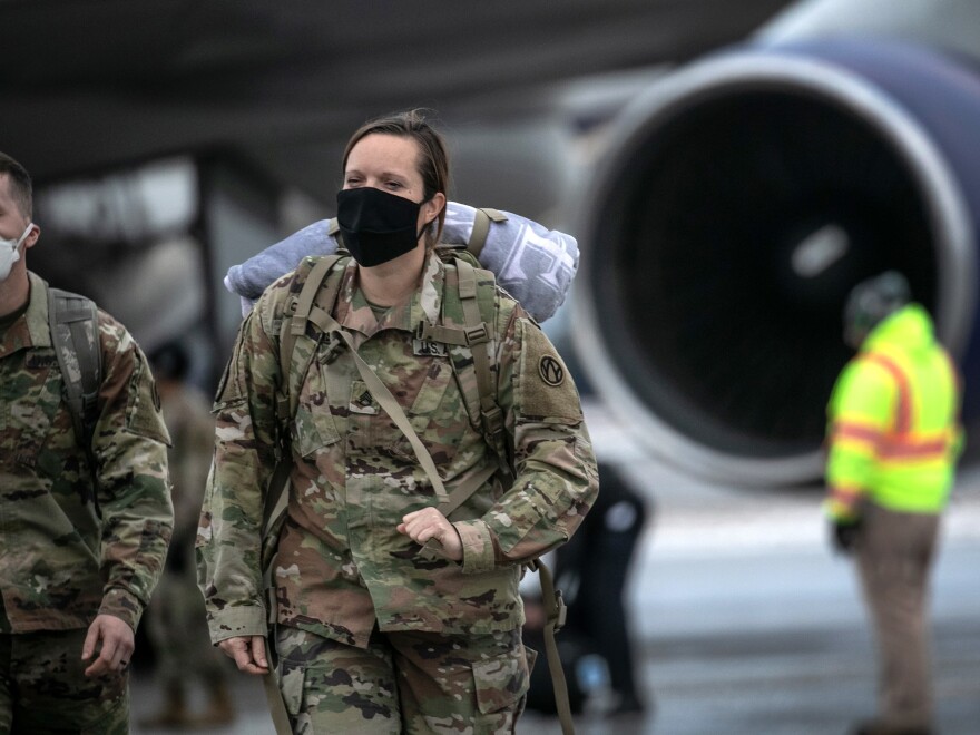 U.S. Army soldiers return from deployment to Afghanistan earlier this month at Fort Drum, N.Y.