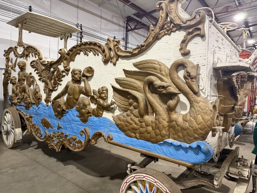 The swan wagon at Circus World exhibits wear and chipped paint.