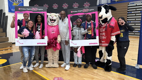 South Bend Riley High School students and staff on Thursday celebrate the school's selection as a finalist in T-Mobile's Friday Night 5G Lights contest for a $1 million football stadium upgrade.