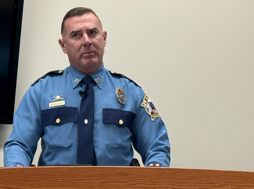 Capt. Tony Wegrzyn, commander of the Alaska Bureau of Investigation, speaks to reporters during a media availability at the Alaska State Troopers post Nov. 24, 2025, in Fairbanks, Alaska. Wegrzyn said the bureau is funneling resources to the area to help investigate multiple violent crimes that have happened recently in and around Fairbanks.