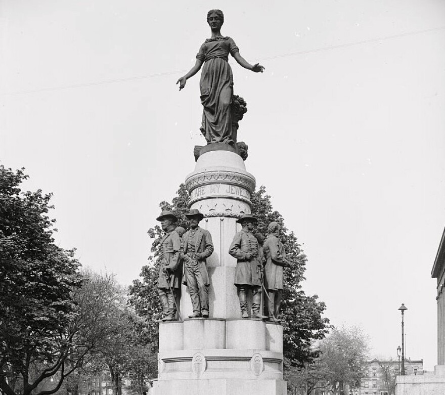 The statue "These Are My Jewels," erected in 1893 at the Ohio Statehouse, features the Roman figure Cornelia. This photo was taken circa 1905.