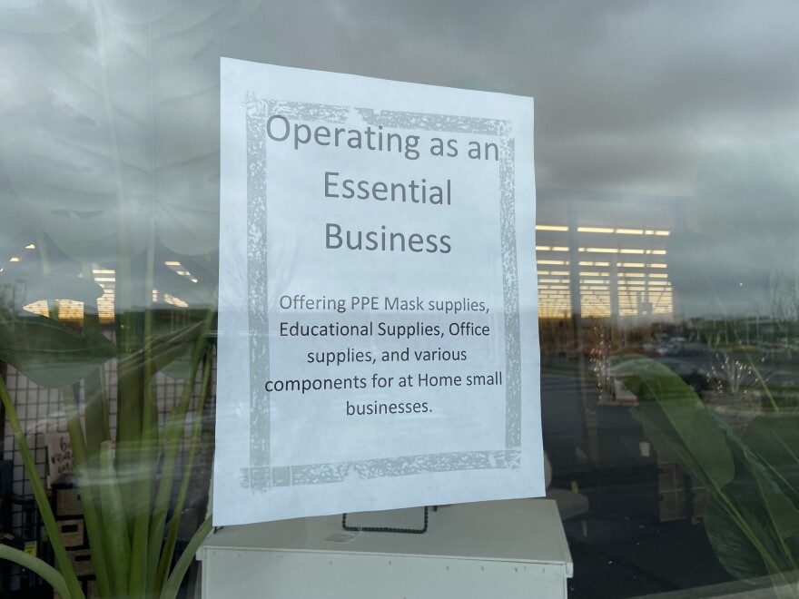 A sign displayed in the front window of a Hobby Lobby craft store in Columbus. The store reopened after the stay at home order was issued, but closed after a cease-and-desist letter from Attorney General Dave Yost on April 2. [Karen Kasler]