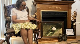 Frances Eason Lamb looking at a photo of the family's homestead in Hobbsville, N.C. The family recently found an 1815 will that allows them to trace its roots back 200 years. The family will honor its enslaved ancestors during a reunion in Chesapeake, July 31 to Aug. 2.