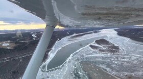 Multiple open holes are seen along a stretch of the Kuskokwim River between Akiak and Tuluksak on Dec. 18, 2024.