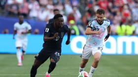 United States' Folarin Balogun (20) controls the ball against Belgium's Nicolas Raskin (23) during the World Cup round of 16 soccer match between the United States and Belgium in Seattle, Monday, July 6, 2026.