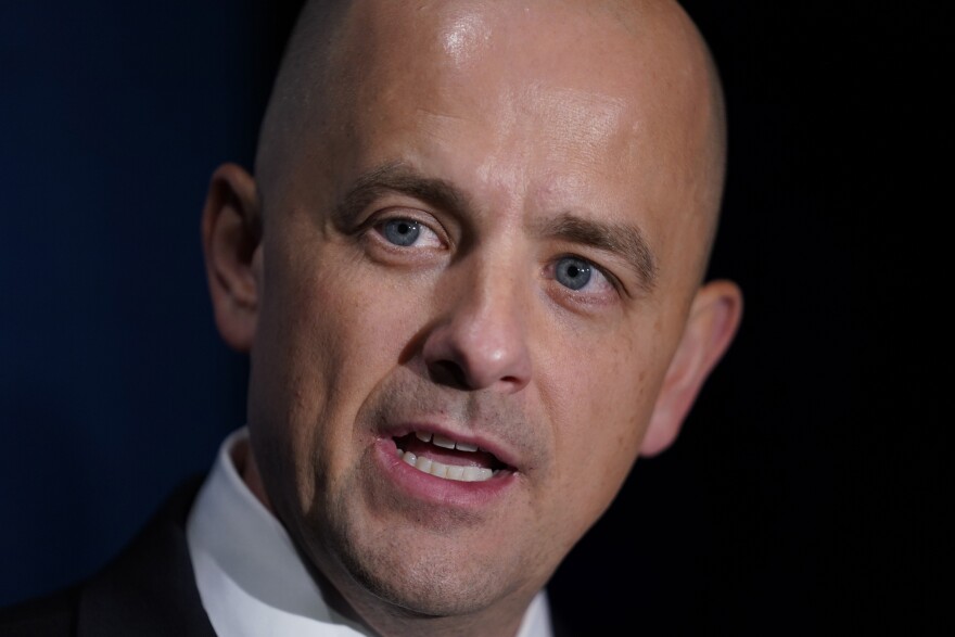 Independent challenger Evan McMullin speaks with reporters following a televised debate with Utah Republican Sen. Mike Lee Monday, Oct. 17, 2022, in Orem, Utah.