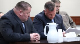 Jason Woodruff (left) and Clint Campion (right) confer during an arraignment hearing on Thursday, Nov. 14, 2024 in Kenai, Alaska.