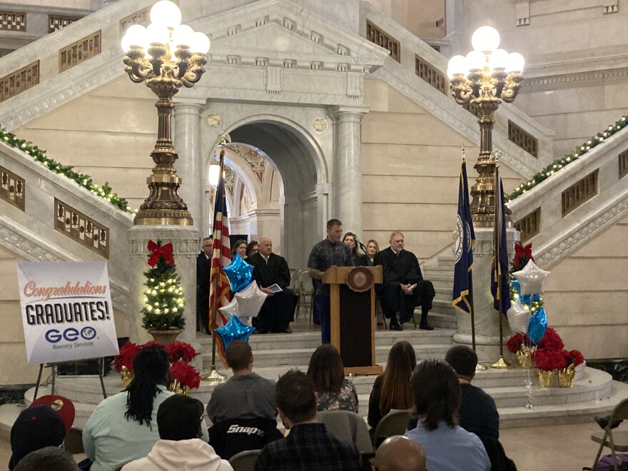 Certified recovery specialist Richard Frey addressed fellow graduates at the Luzerne County Courthouse.