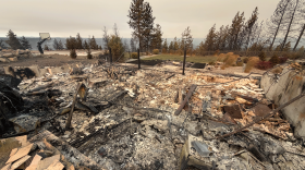 Ryan Herzog and Annie Voy, partners and economics professors at Gonzaga University, lost their home in early August as a trio of wildfires swept through north Spokane. Almost nothing was salvageable after the fire destroyed their home the afternoon of Aug. 1, according to Herzog.