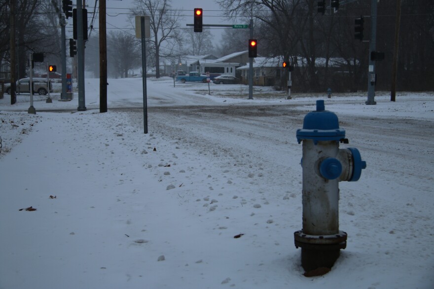 Snow will stick around and travel could become treacherous as the mercury dips.