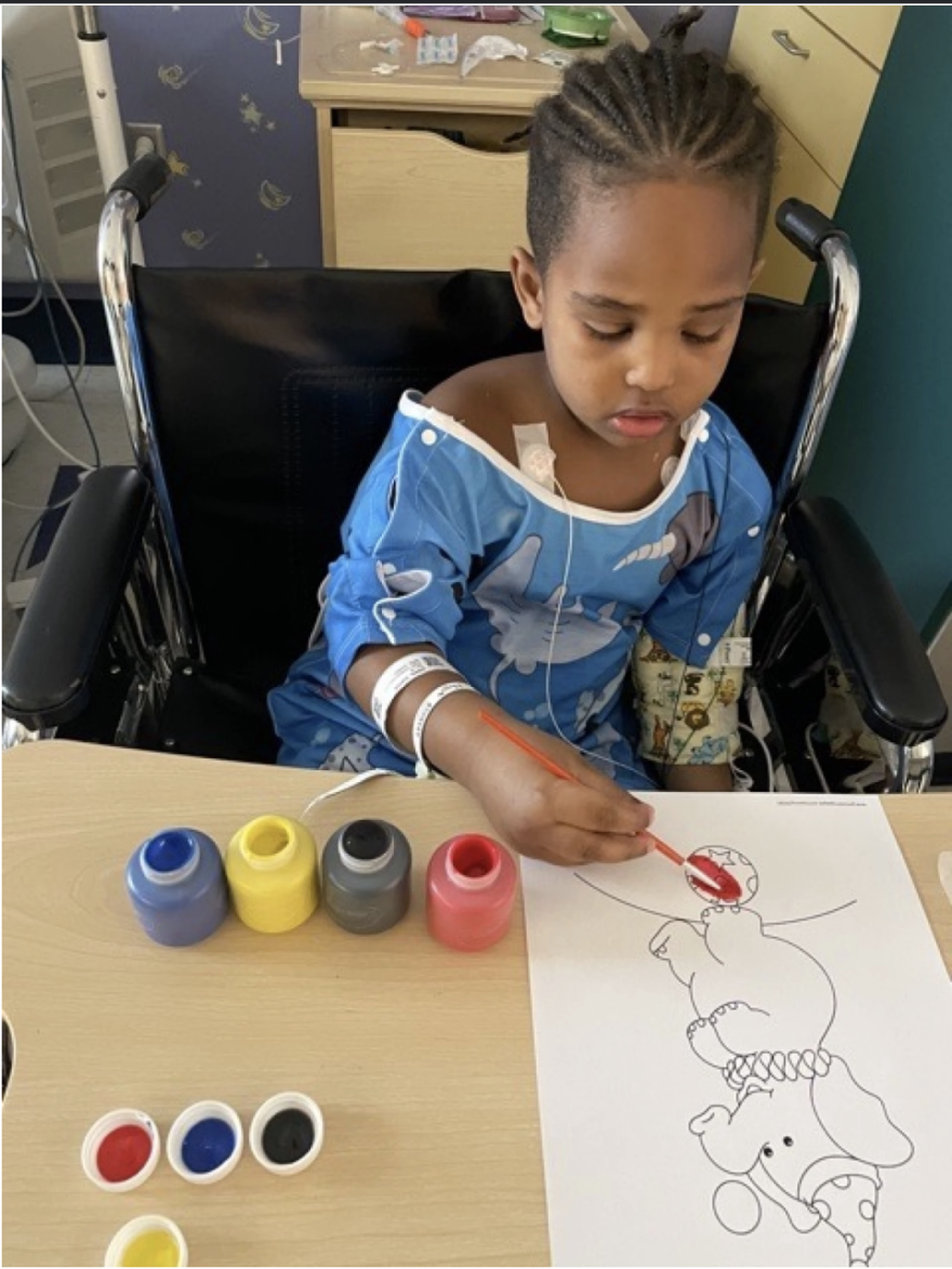 Five-year-old Kevin in the hospital where he spent 15 days, four of them in the ICU.