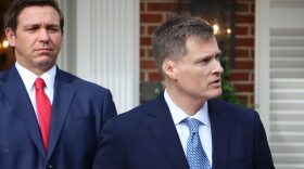 Gov. Ron DeSantis (left) stands alongside his newest appointee to the Florida Supreme Court, Carlos MuÃ±iz, outside the Governor's Mansion on January 22, 2019