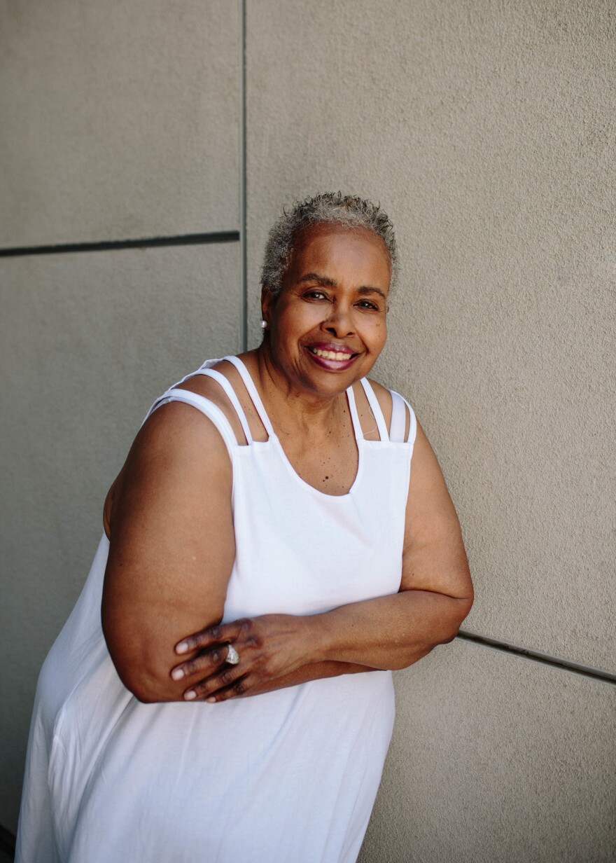 Veronica Bryant, 73, stands in the breezeway of the Long Beach Senior Arts Colony. She uses most of her Social Security income for rent.