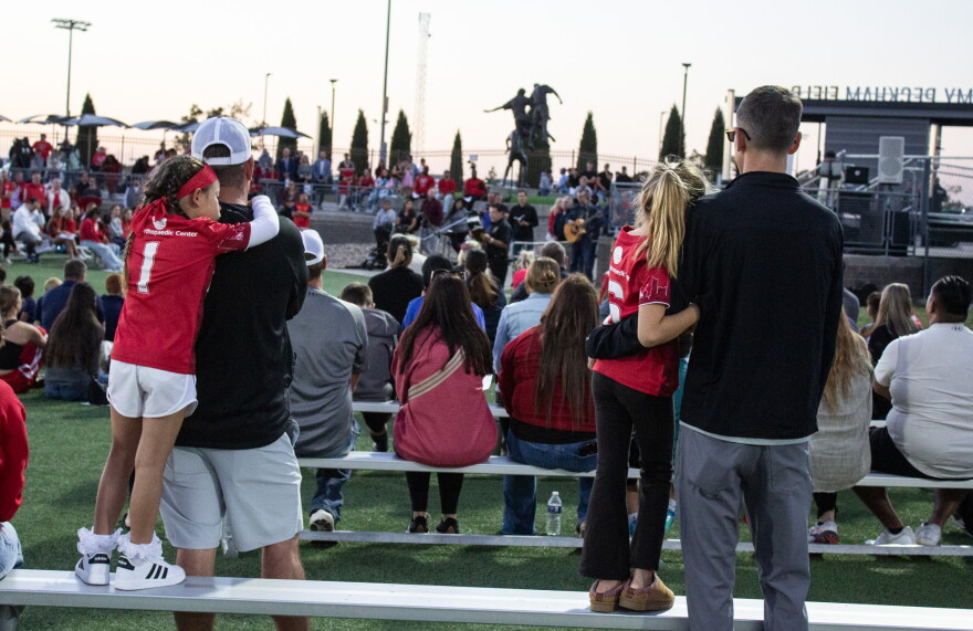 Members of the soccer community attend a vigil on Wednesday evening for the victims of a deadly crash at the Stryker Sports Complex in Wichita.