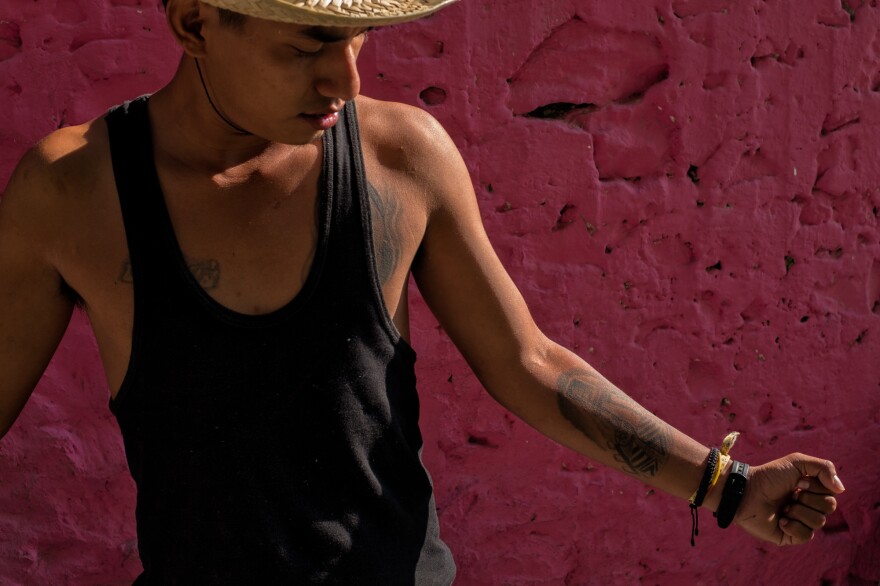 This tattoo is a reminder of Israel's first journey aboard <em>La Bestia</em> as an unaccompanied minor in 2011, when he was 16 years old. Mexico City, Oct. 19, 2017.