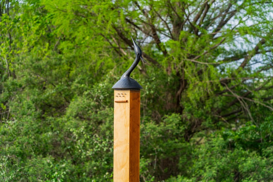 J.C King's Ghost Harps on Holly Overlook features six Aeolian harps — wind activated string instruments — with a blue heron atop each.