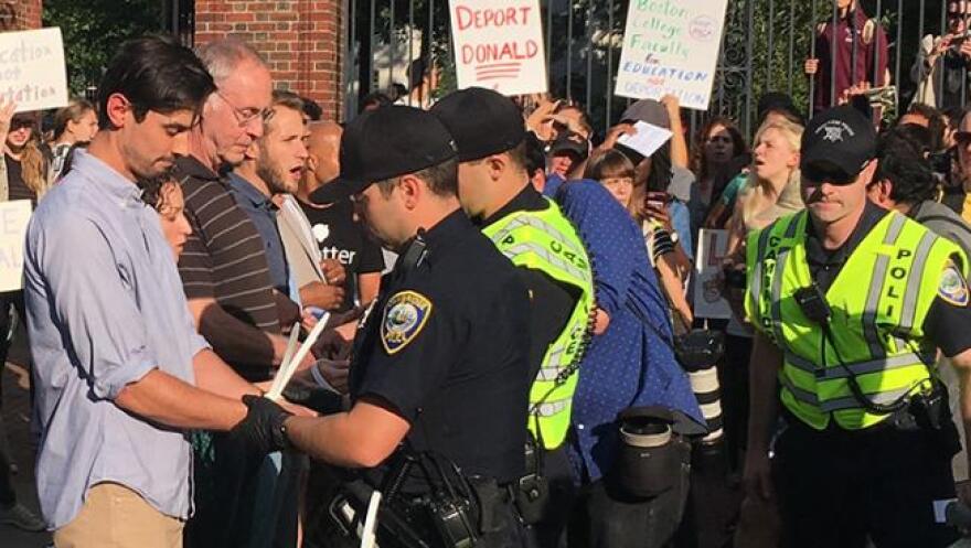 Boston-area university faculty are arrested during a protest of the Trump administration's action on DACA. 