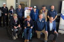 The 6 Dream Flight recipients pose for a pre-flight photo with