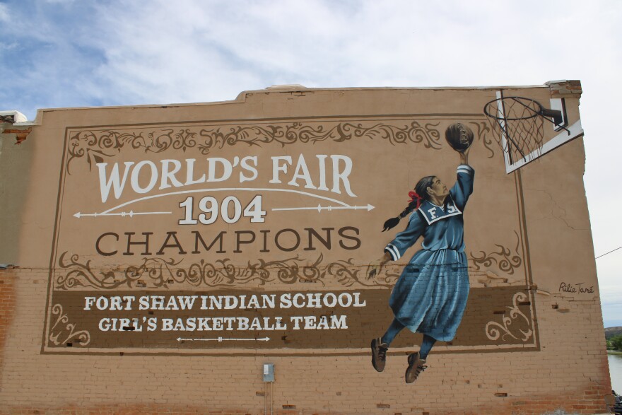 A mural depicting a player on the Fort Shaw Indian Girls Basketball Team.