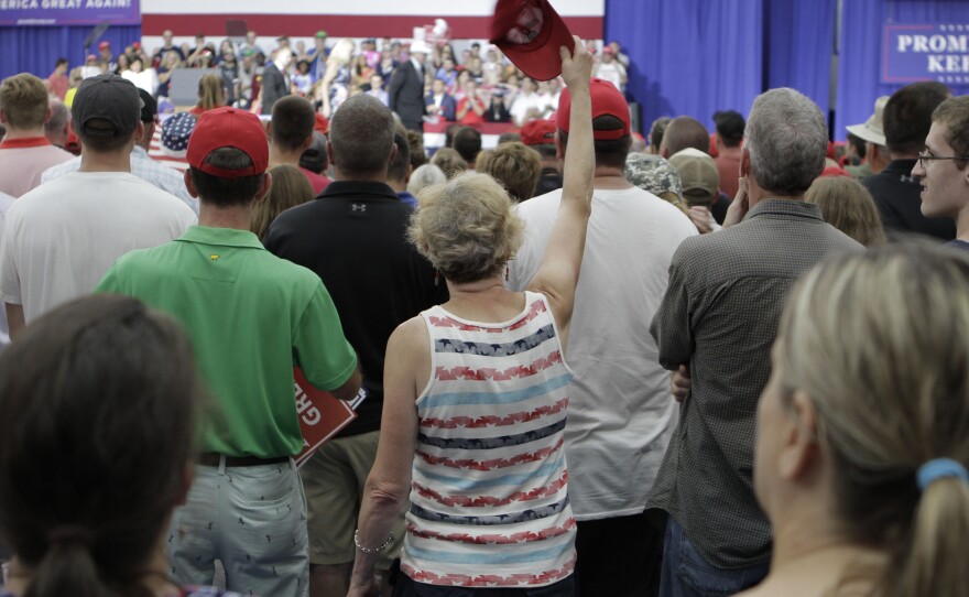 Supporters packed a high school gymnasium Saturday to see President Trump.  Hundreds more watched on video screens outside.