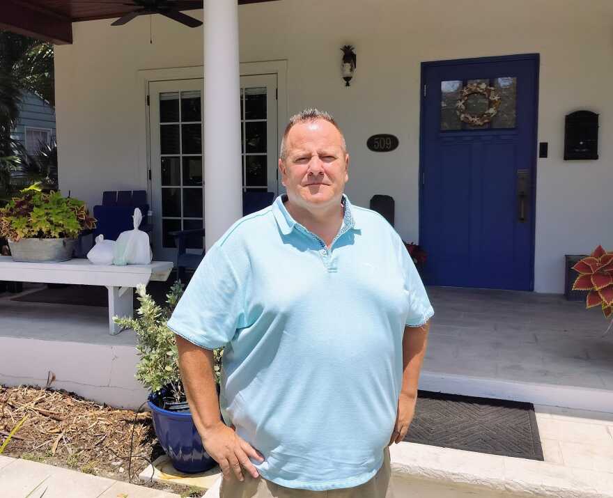 Tom Strauser outside his Old Northwood home.
