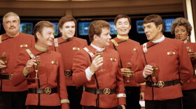 Dec. 28, 1988,  "Star Trek" crew, from left, James Doohan, DeForest Kelley, Walter Koenig, William Shatner, George Takei, Leonard Nimoy, and Nichelle Nichols, toast the newest "Star Trek" film during a news conference at Paramount Studios.