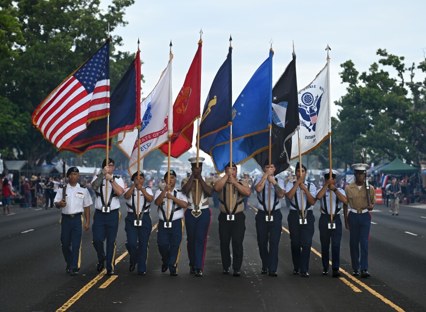 The United States Joint Color Guard leads the 80th Guam Liberation Day parade in Hagatña, Guam, July 21, 2024. 