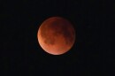 The moon appears red during a total lunar eclipse seen from Rawalpindi, Pakistan, Sunday, Sept. 7, 2025.