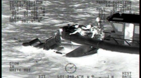 A 27-foot Utility Boat-Medium boat crew from Station Yankeetown, Florida, rescues two adults and two children from the pictured 18-foot flooded boat 10 miles west of Aripeka, Florida, Sunday, May 15, 2016. The people were transported safely to shore with no reported injuries. (U.S. Coast Guard photo)