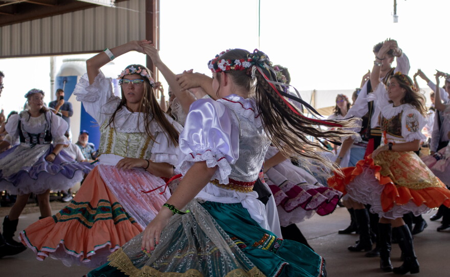 Members of West's Junior Historians dance polka during the 50th anniversary of Westfest on Saturday. The group has been performing at Westfest since its creation in 1976.