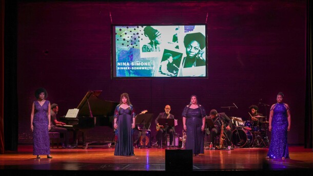 Karolyn Lee Gholston, Keyona Willis, Destiny Coleman and DeMeeshia Marshall standing onstage performing in Coleman's 'The Journey: Civil Rights'
