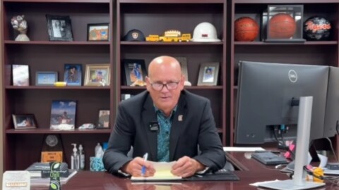 Commerce ISD Superintendent Steve Drummond addresses a youtube audience from behind his desk on August 13, 2026.