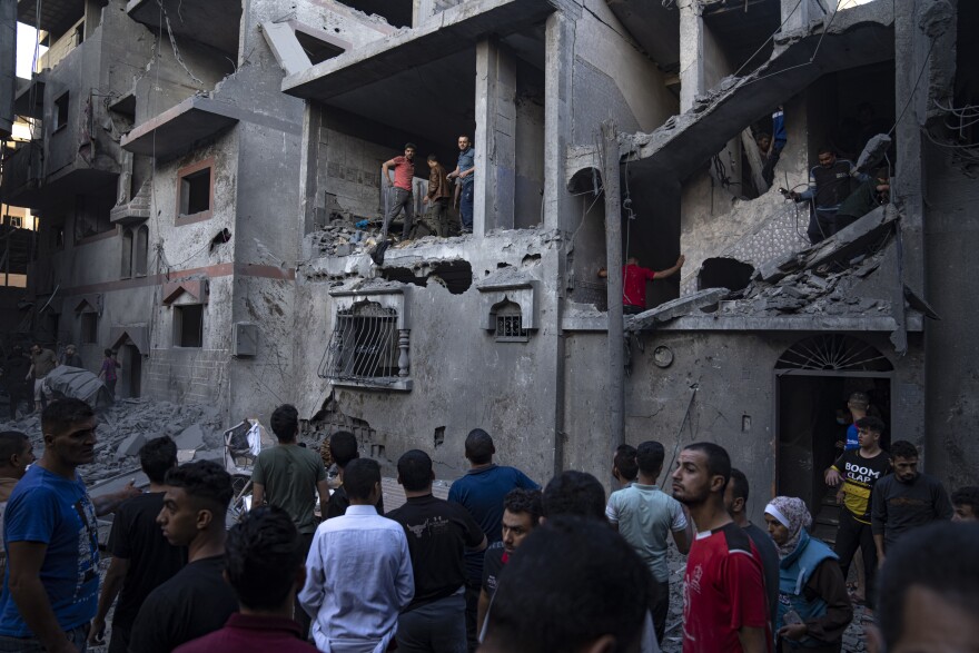 Thu., Oct. 19: Palestinians evacuate wounded from a building destroyed in Israeli bombardment in Khan Younis, Gaza Strip.