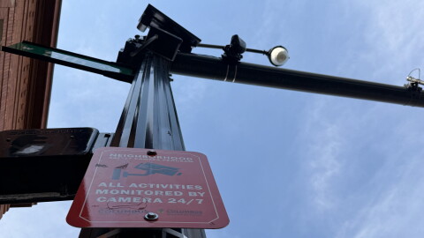 A Flock Safety automatic license plate camera was covered with a plastic bag on September 4, 2026 by the Columbus Division of Police after Mayor Andrew Ginther suspended the use of the surveillance technology.