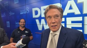 Perry Johnson speaks with reporters after a Republican gubernatorial primary debate on July 9, 2026.