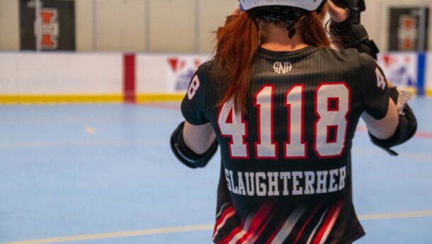 Valeria Gambrel, known on the track as Slaughterher, gears up for practice ahead of the team's first home game. Gambrel has been playing with the club since she was in sixth grade and now plays for the adult team.