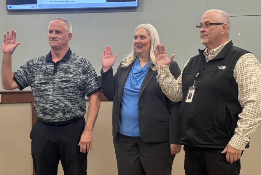 Bobby, Michaelson, Cyndi Hanson and Jan George are sworn in for four-year terms on the Sioux City School Board on November 24, 2025. (Bret Hayworth. Siouxland Public Media News)