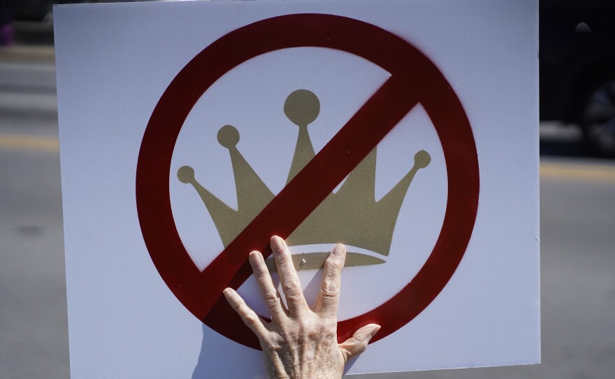 Participants in Greenville joined Saturday’s “No Kings” rally carrying signs protesting the Trump administration.