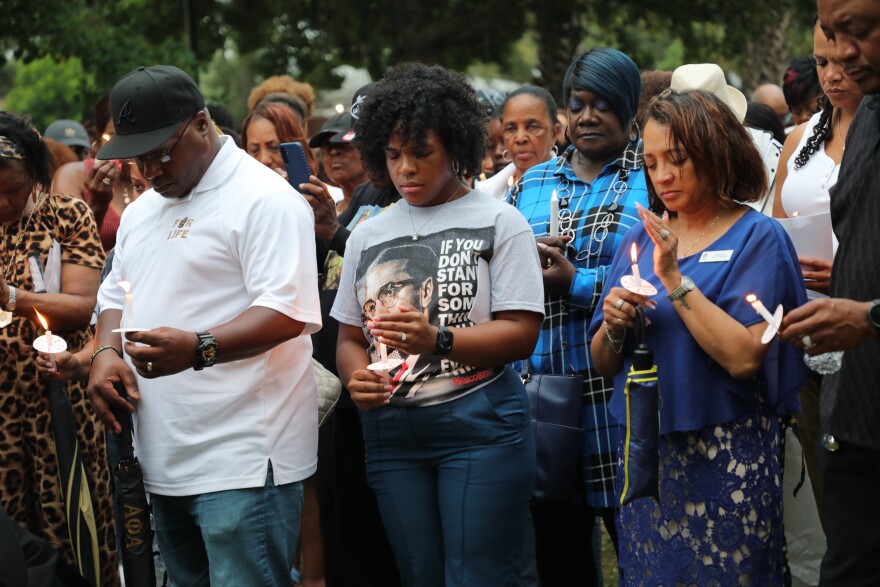 People gather for a vigil honoring Roger Fortson on May 17, 2024.
