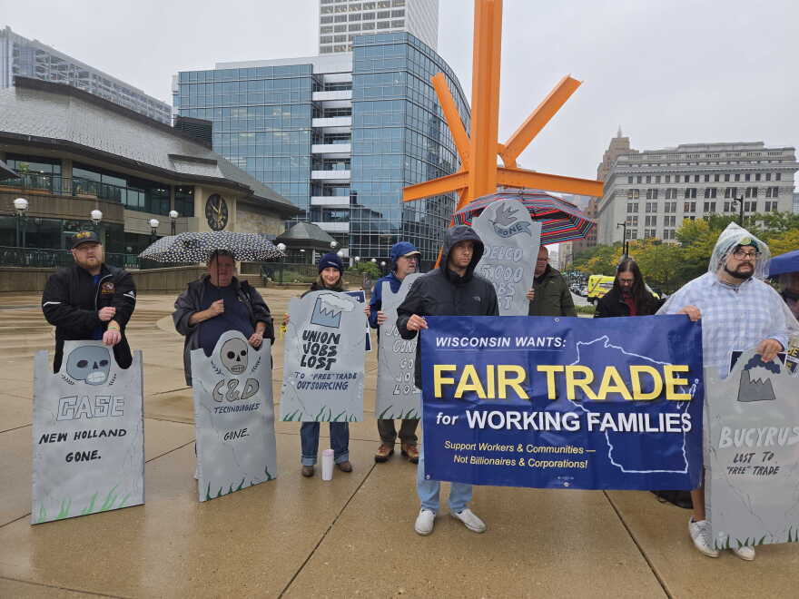 People gathered in downtown Milwaukee in support of worker-centered trade policy.