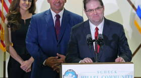 On Monday, Jan. 14, 2019, Judge Robert Luck, right, smiles and gives brief remarks after being selected to the Florida Supreme Court by Florida Gov. Ron DeSantis, center, standing next to his wife, Casey, left.