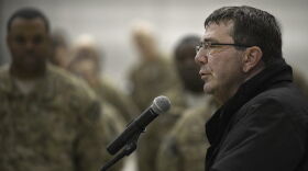 U.S. Deputy Secretary of Defense Ash Carter, right, speaks with Service members at Bagram Airfield, Afghanistan, Nov. 28, 2013.