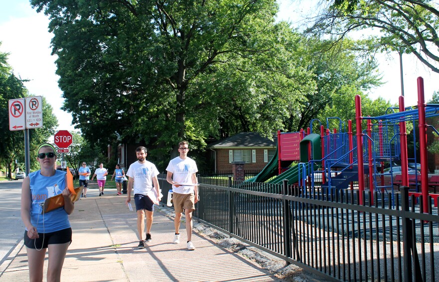 Gavin Schiffres and Jack Krewson, right, canvass the Dutchtown neighborhood with members of the school choice advocacy group Children Education Alliance of Missouri June 8, 2017. Schiffres and Krewson want to open a charter school in the neighborhood.