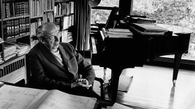 

Aaron Copland at the work desk at his home in Cortlandt Manor, N.Y., ca. 1978.