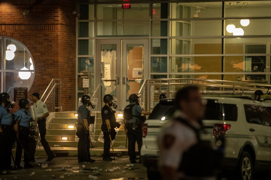 Protesters destroyed glass and spray-painted the Ferguson Police Department May 30, 2020. They later damaged other nearby buildings.